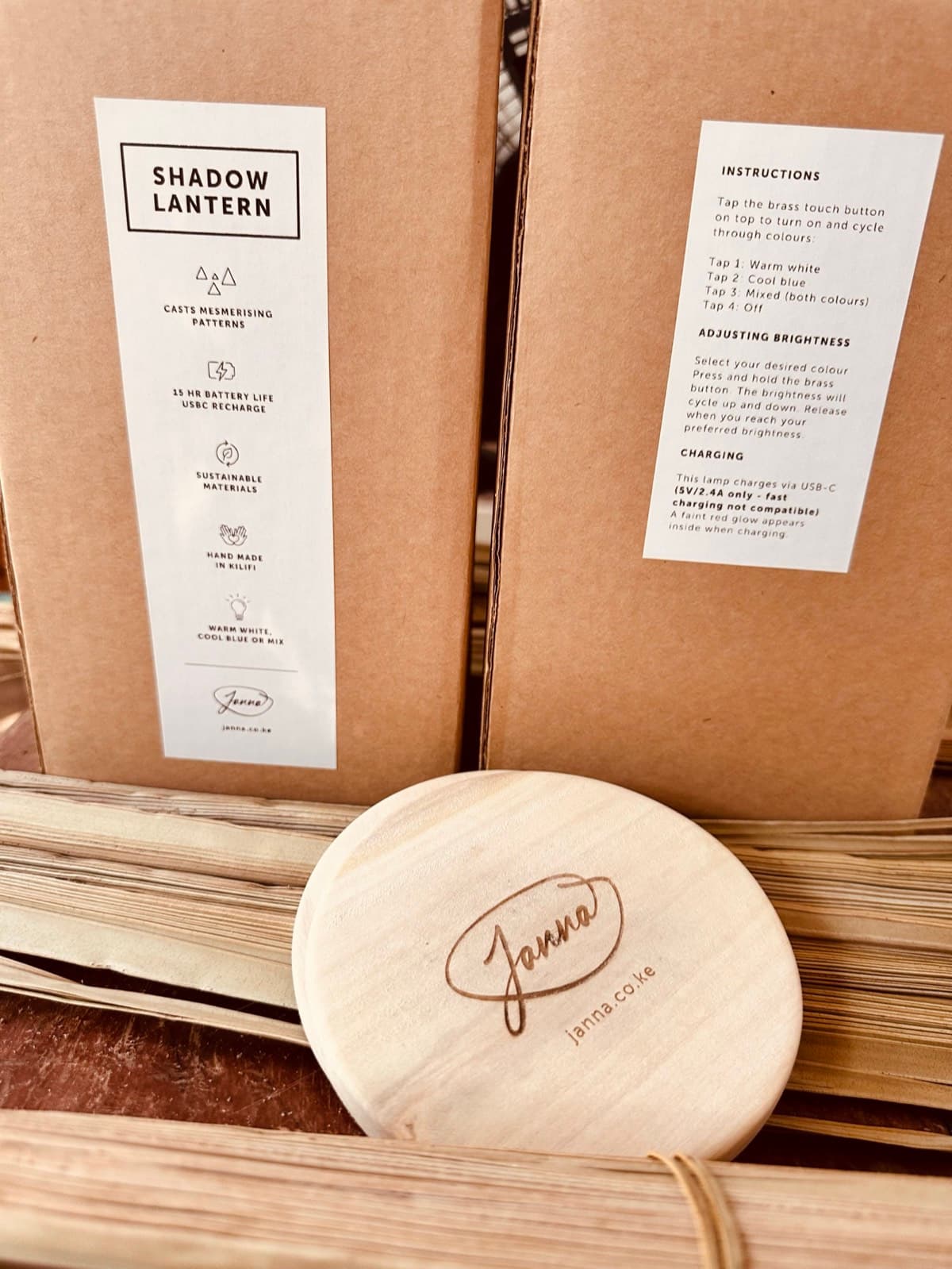 Shadow Lantern product boxes with instructions label, palm strips and wooden disc